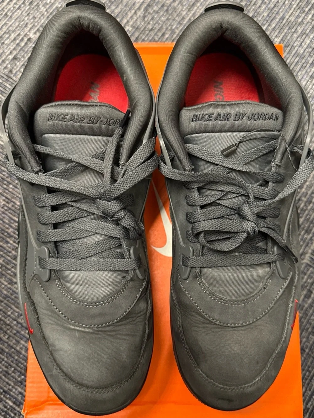 Jordan 4 RM SP Nigel Sylvester Driveway Grey Sneakers with Red Accents